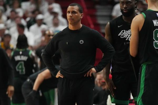 Boston Celtics head coach Joe Mazulla directing his team during the first half of a 2024 NBA playoffs game against the Miami Heat