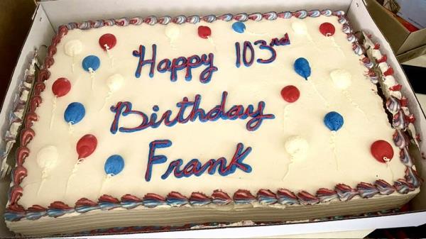 A birthday cake decorated "Happy 103rd Birthday Frank" was waiting for Pugliano at the party.