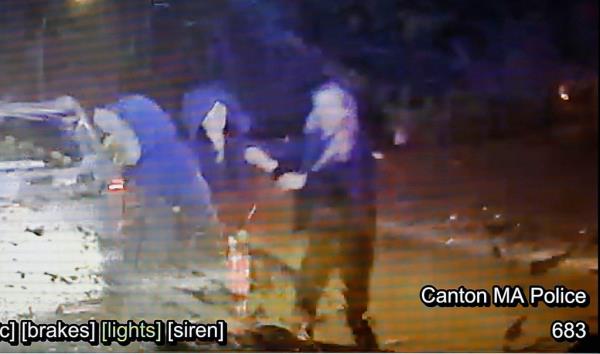 Police dash cam video shows Karen Read, right, after finding John O'Keefe in the snow.