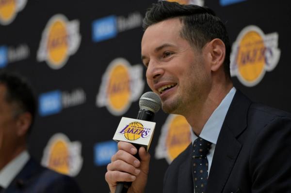 The Los Angeles Lakers head coach JJ Redick speaks to the media during an introductory news conference.